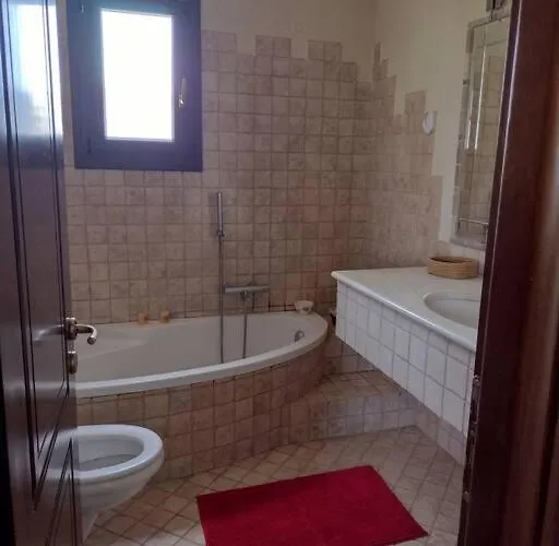 By The River Near Meteora Vilă